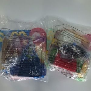 Two McDonald’s Aladdin happy meal toys- Genie and Abu/carpet
